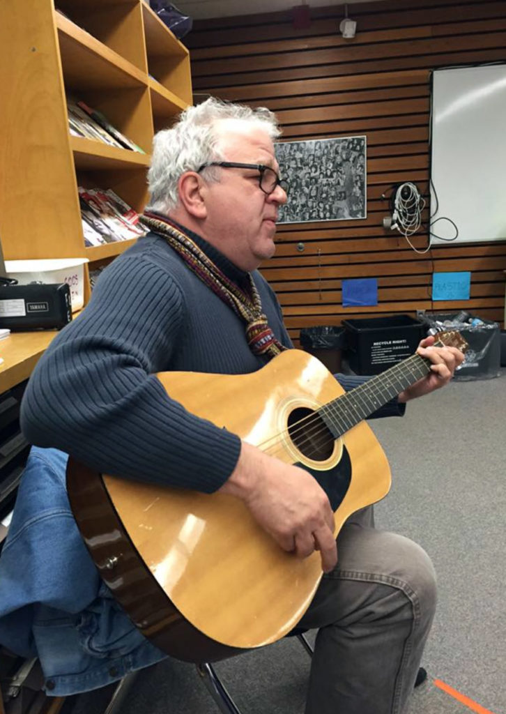 dan playing guitar
